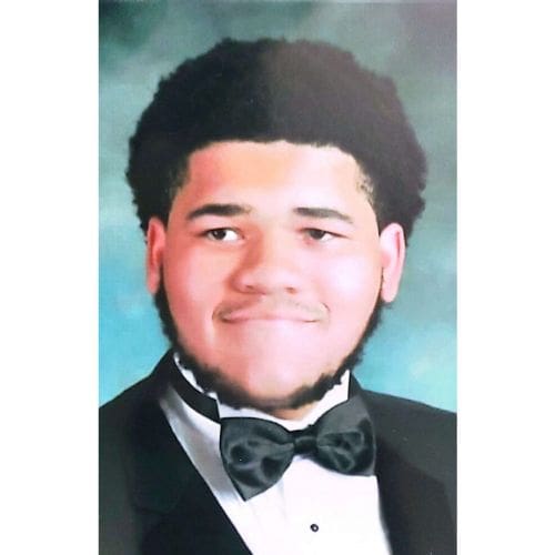 Senior portrait of young man in tuxedo