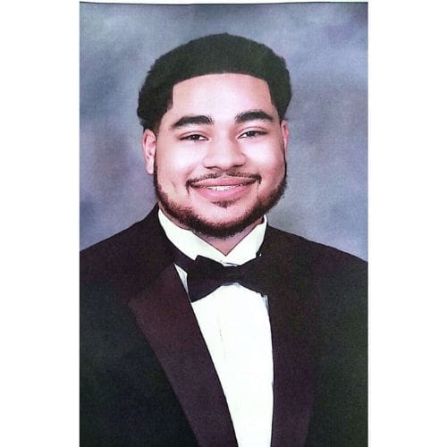 Smiling man in tuxedo portrait