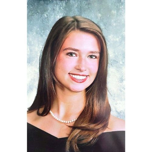 Senior portrait of young woman wearing pearls